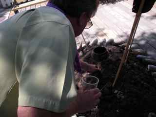 Tiburon Art Festival- Pushing Coins into the Earth Mound